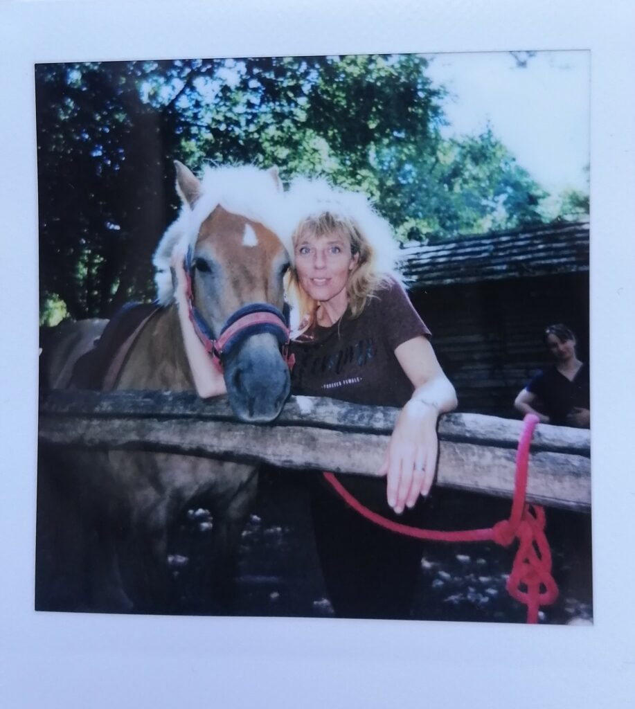 woman with horse on polaroid picture